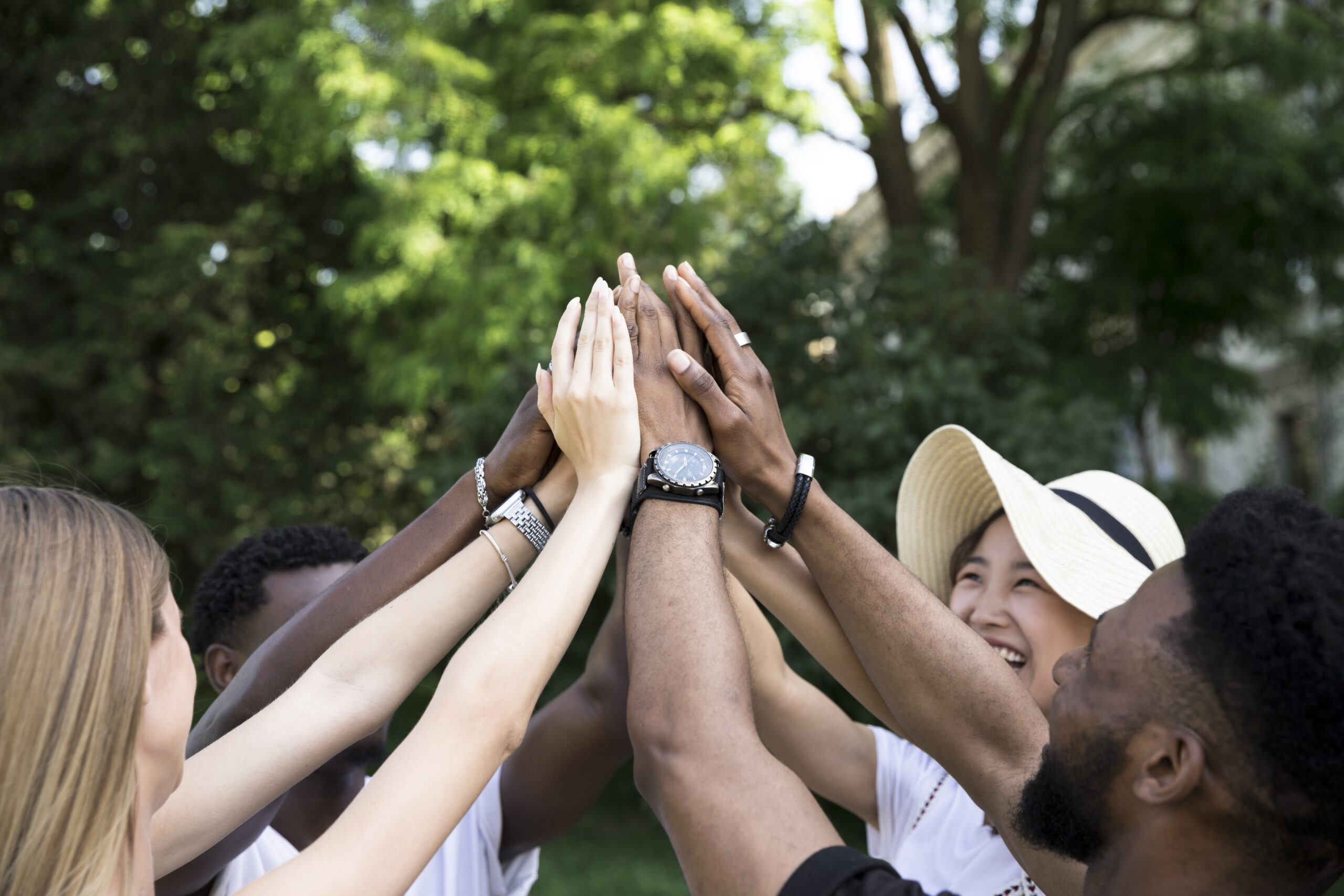 front view interracial friends cheering